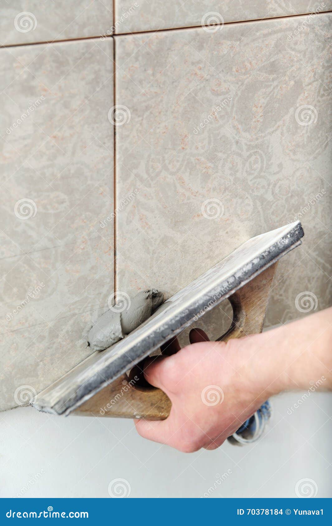 Fill the Tile Joints with Grout. Stock Photo Image of grout, rubbing
