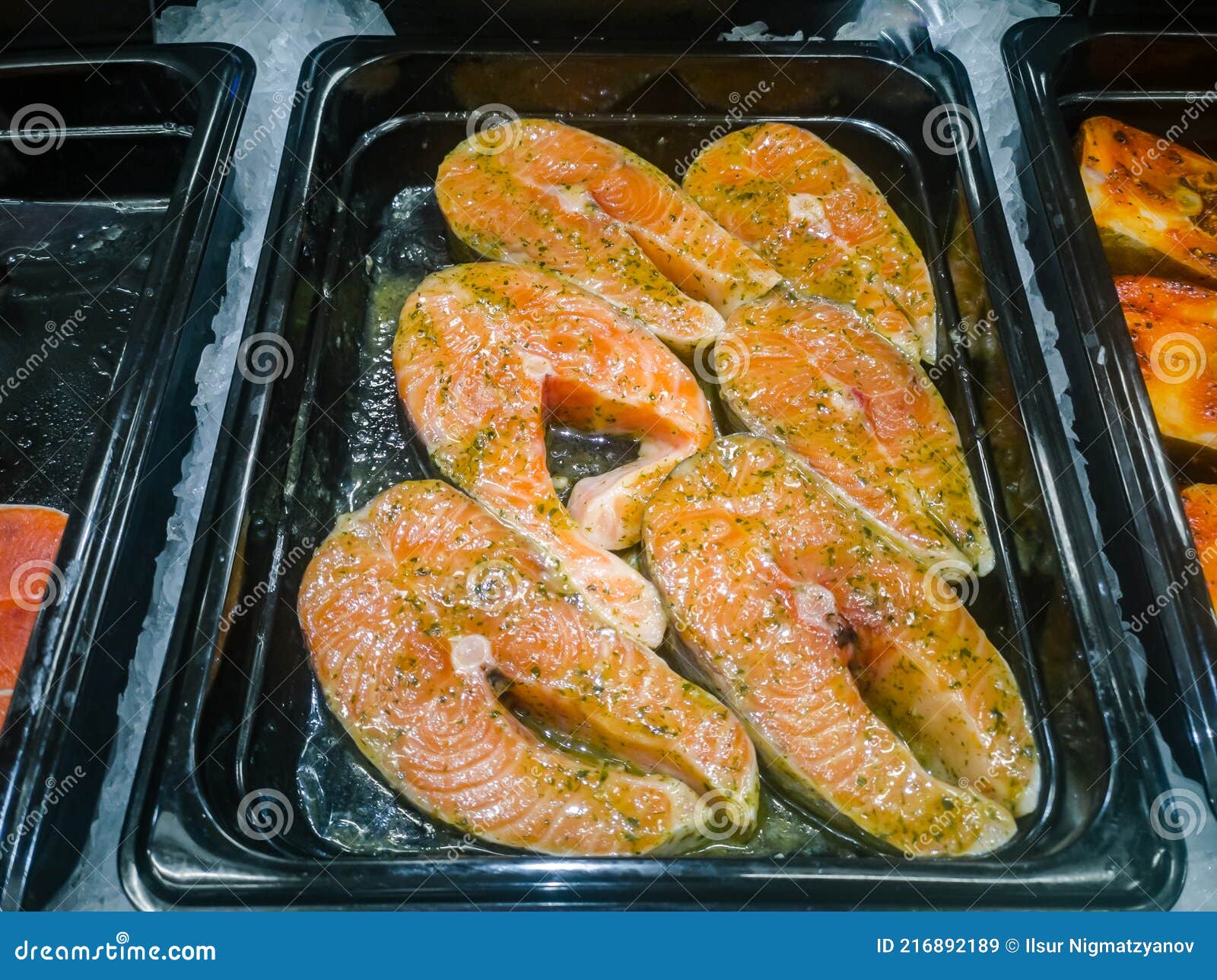 Fillet of Red Fish Marinated with Spices for Cooking Stock Image