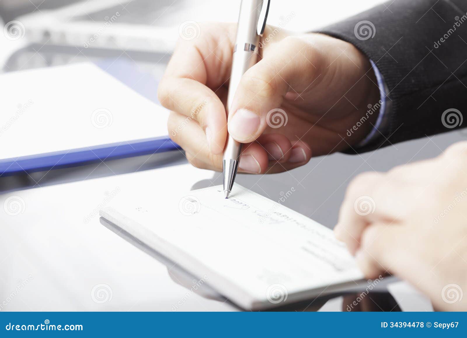 Filling a cheque stock photo. Image of hand, full, document - 34394478