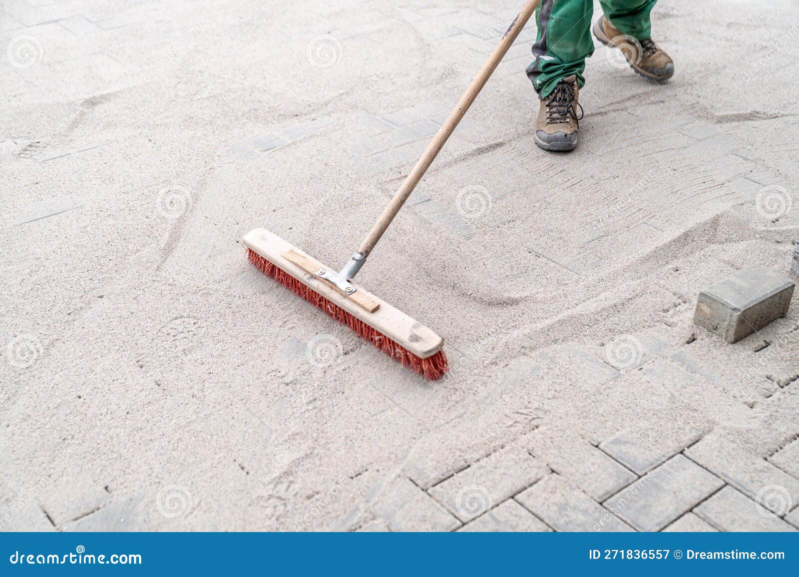 Filling the Gaps in the New Pavement with Sand Stock Image Image of