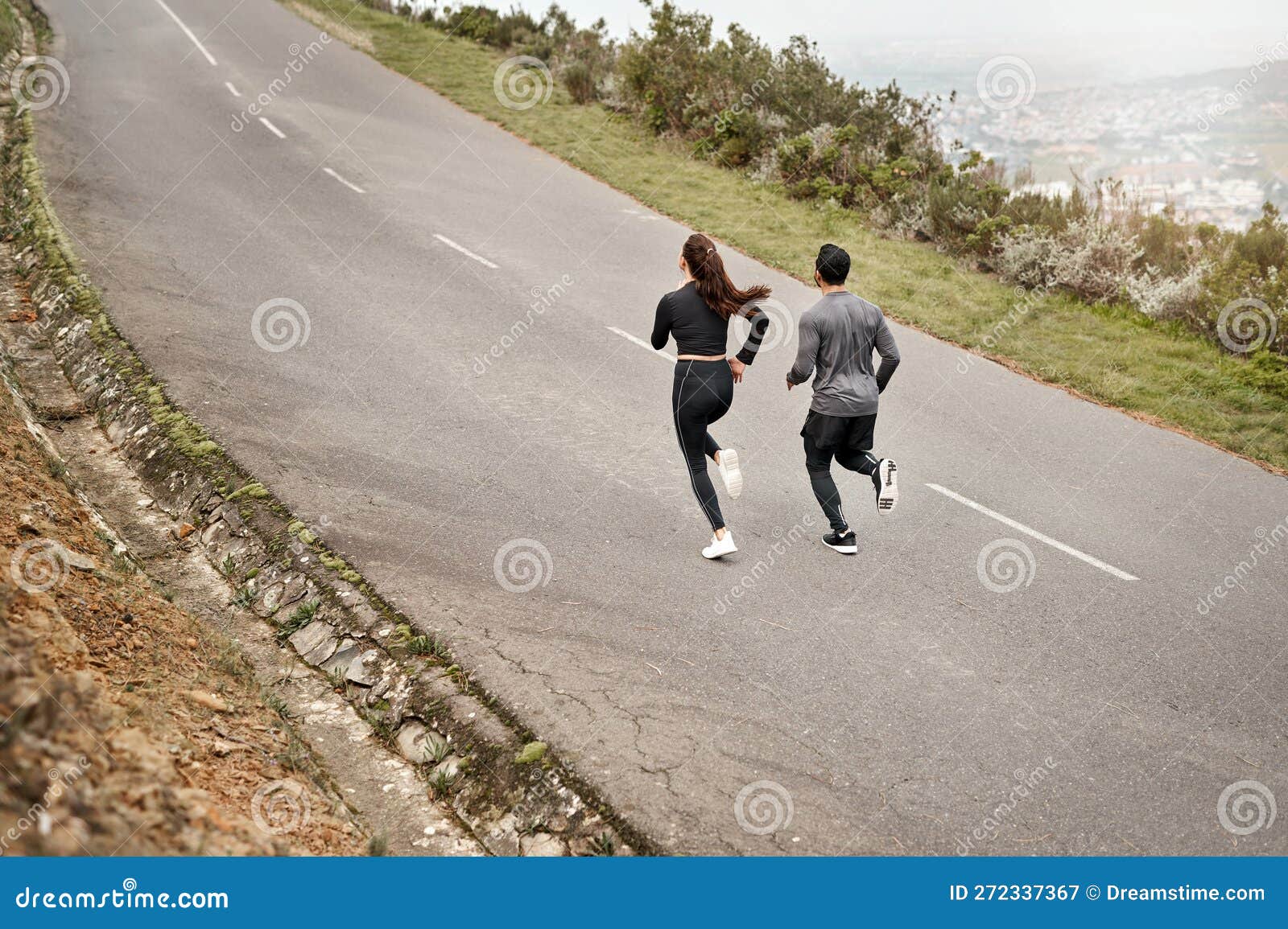 The Final Push of the Race. Full Length Shot of Two Unrecognizable