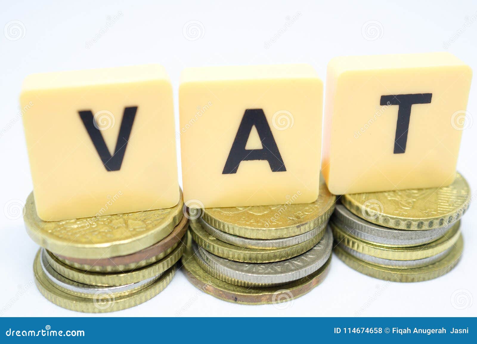 Finance Concept With Stack Of Coins - VAT Value Added Tax ...