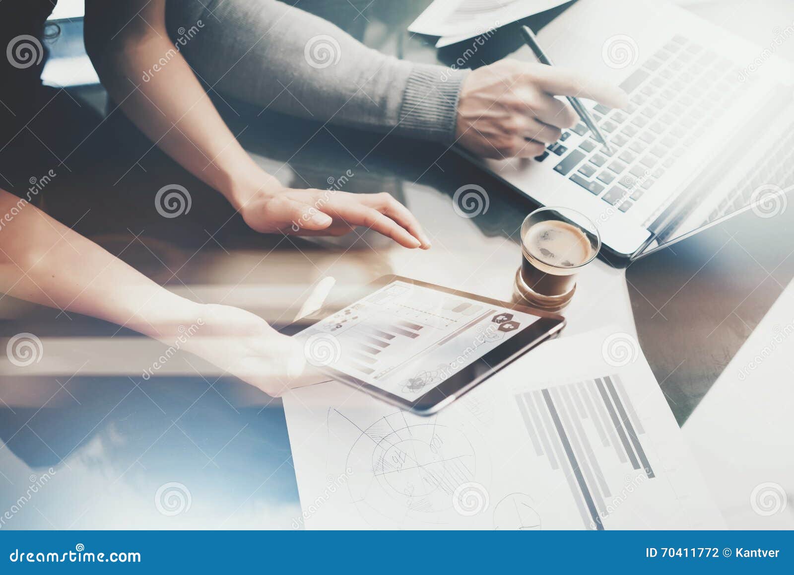 Finance investment work process.Photo woman showing business report modern tablet,diagram screen.Banker man holding pen for signs document,discussion startup idea.Horizontal.Film and bokeh