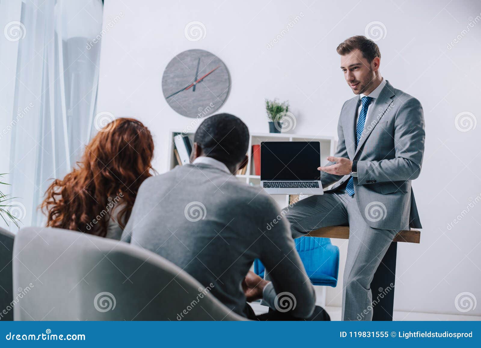 Financial Adviser Showing Presentation on Laptop To Stock Image Image