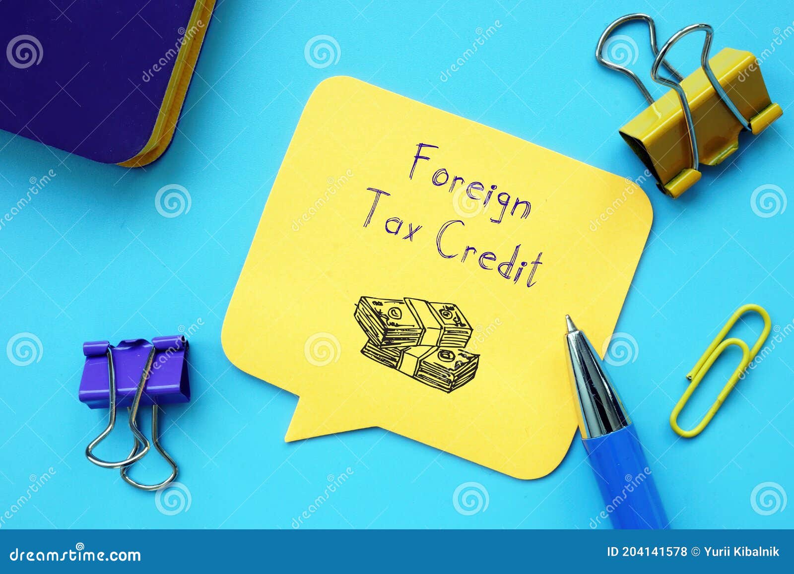 financial-concept-about-foreign-tax-credit-with-sign-on-the-page-stock