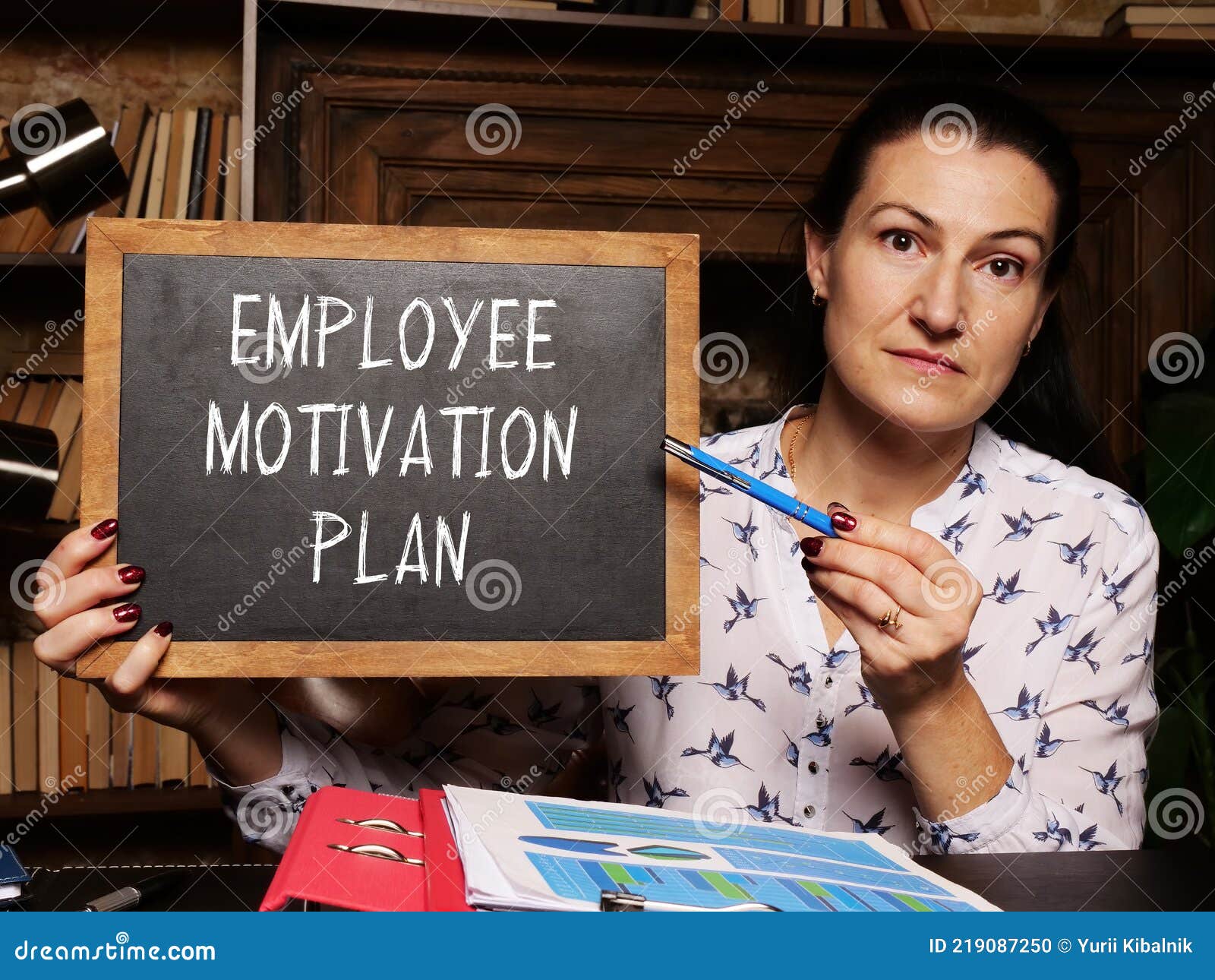Financial Concept Meaning EMPLOYEE MOTIVATION PLAN with Phrase on the