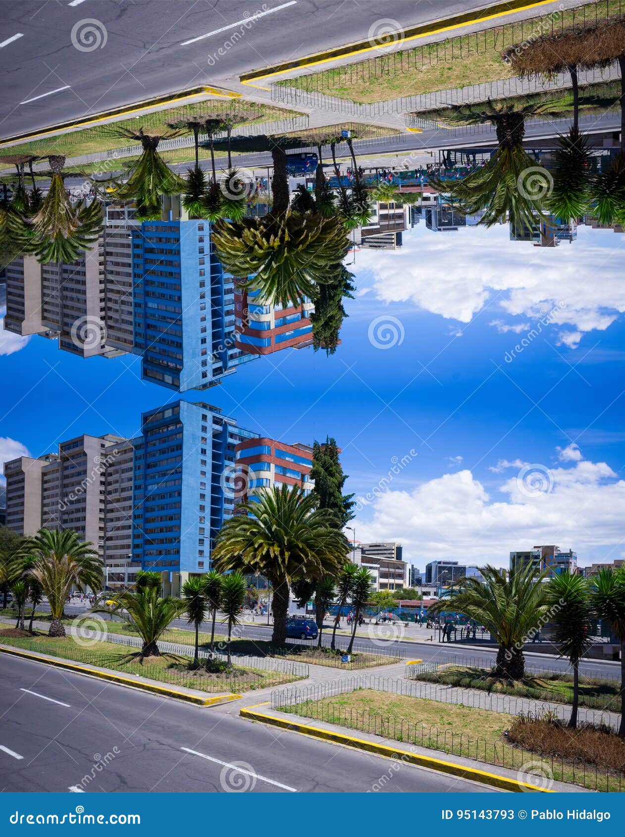 financial district of quito, naciones unidas boulevard with mirrored effect in the city of quito ecuador