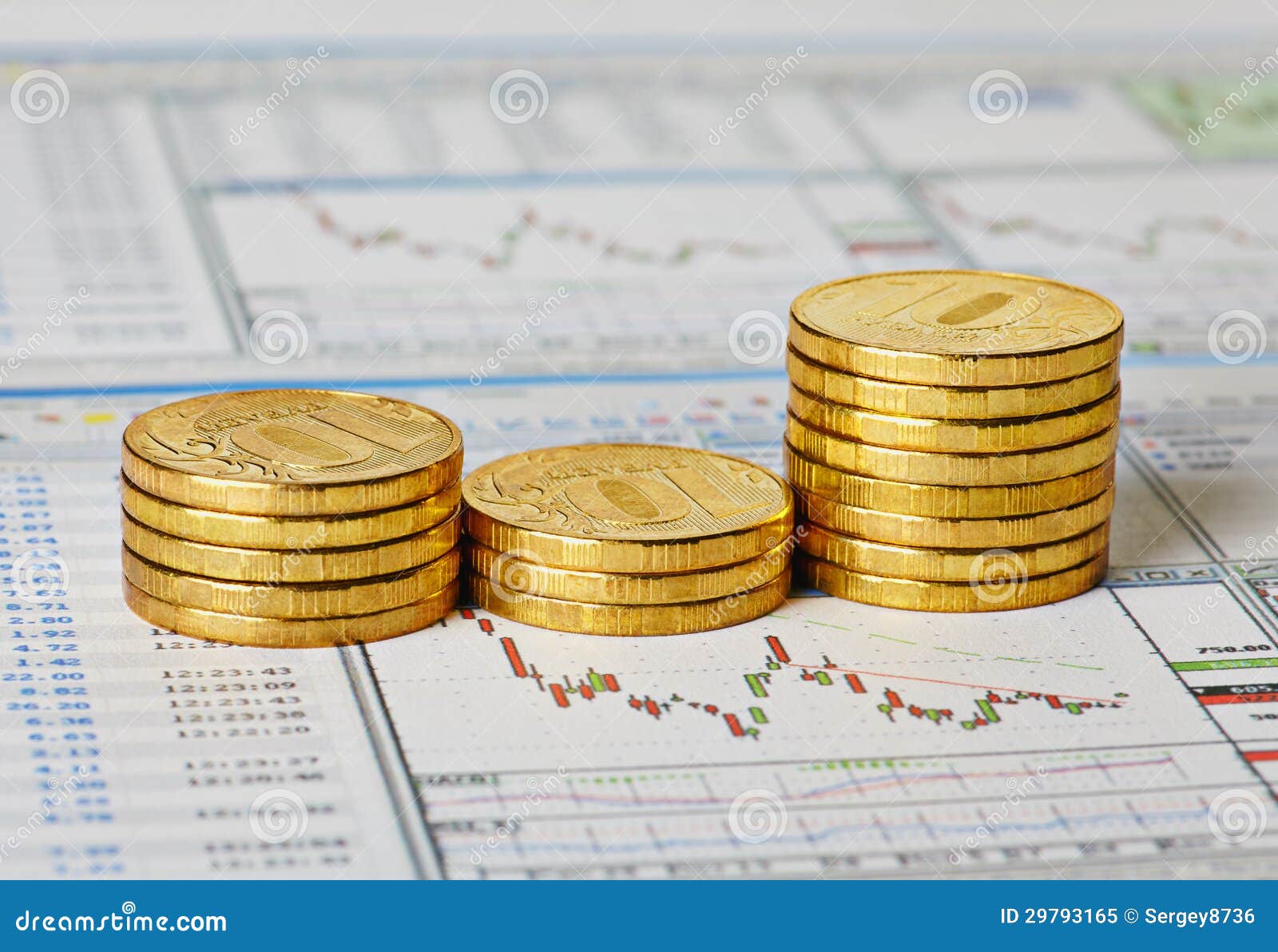 Financial Settlement with the Charts and Golden Coins. Stock Image
