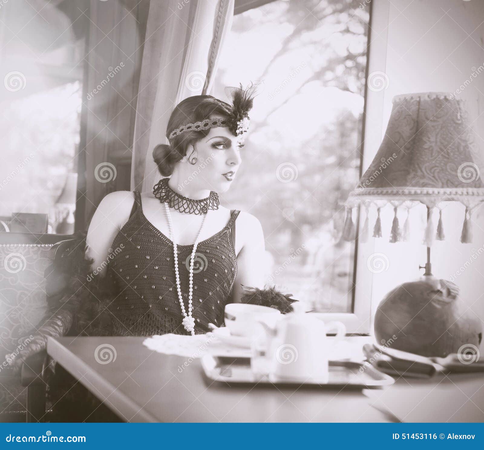 Beautiful Vintage 1920s Lady Wearing A Headband And White Feather Boa Stock  Photo, Picture and Royalty Free Image. Image 30603487.