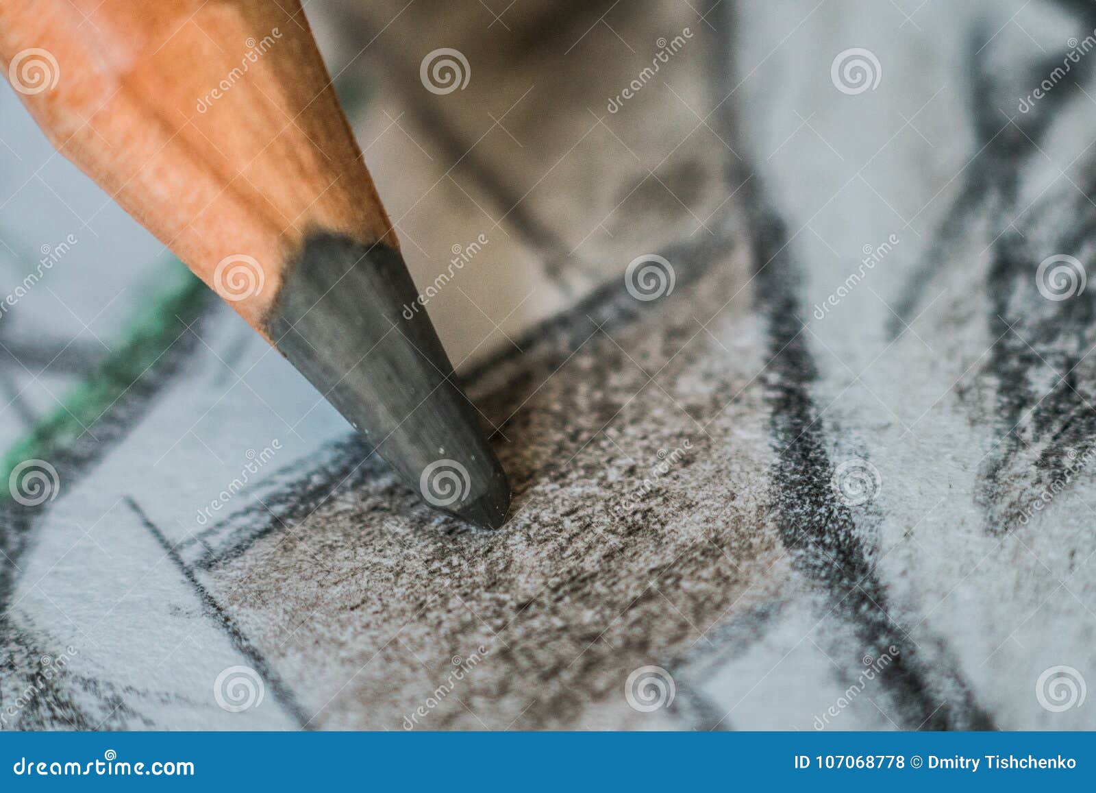 Fine ad angolo sulla macro di un disegno a matita della grafite una linea su Libro Bianco strutturato