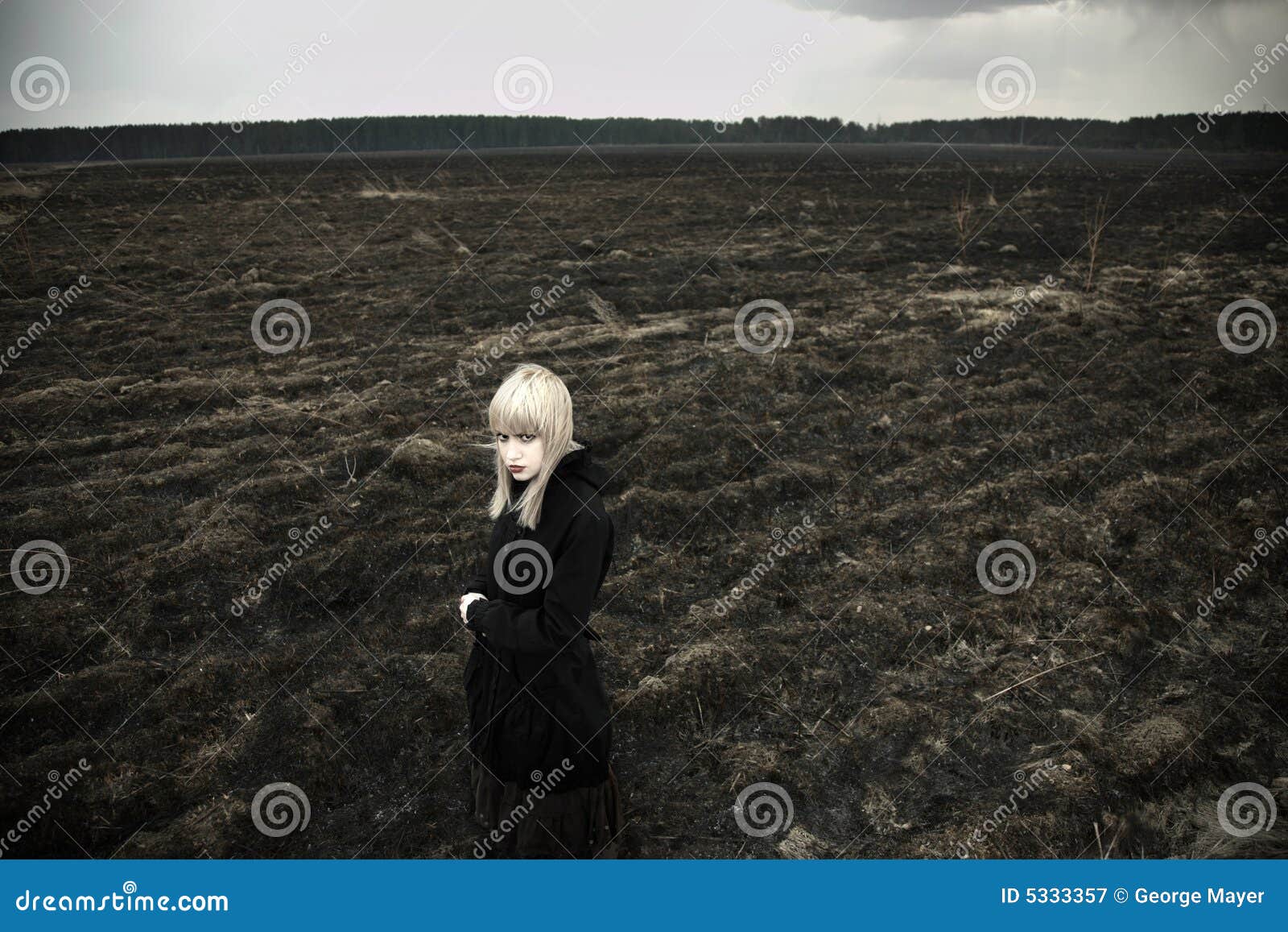 fine art portrait of girl on black field