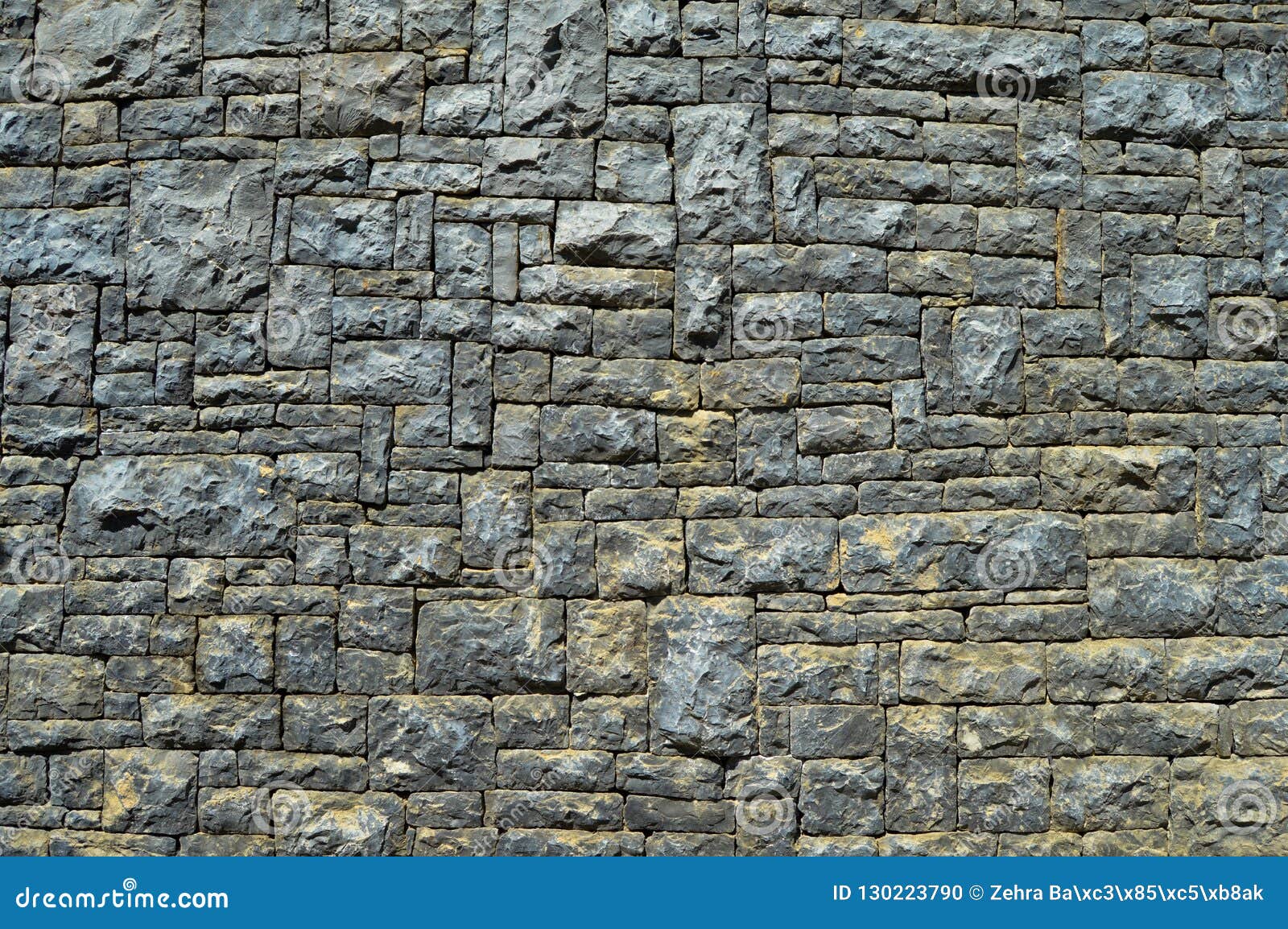 Fine cut blue stone wall stock photo. Image of cement 130223790