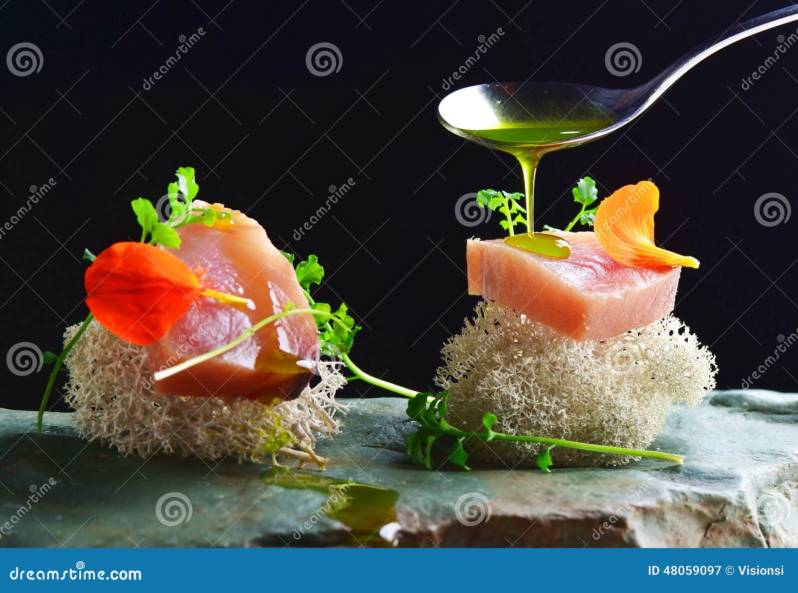 fine dining, fresh raw ahi tuna sashimi served on an ocean sponge
