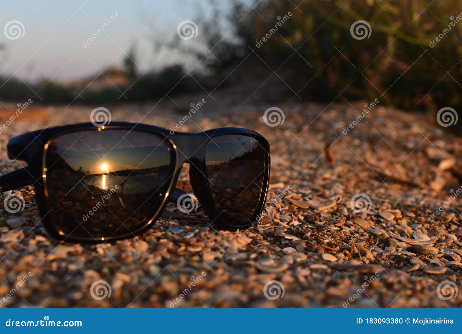 Fine Sand from Shells Close Up, on Sand Black Glasses Lie, Points are ...