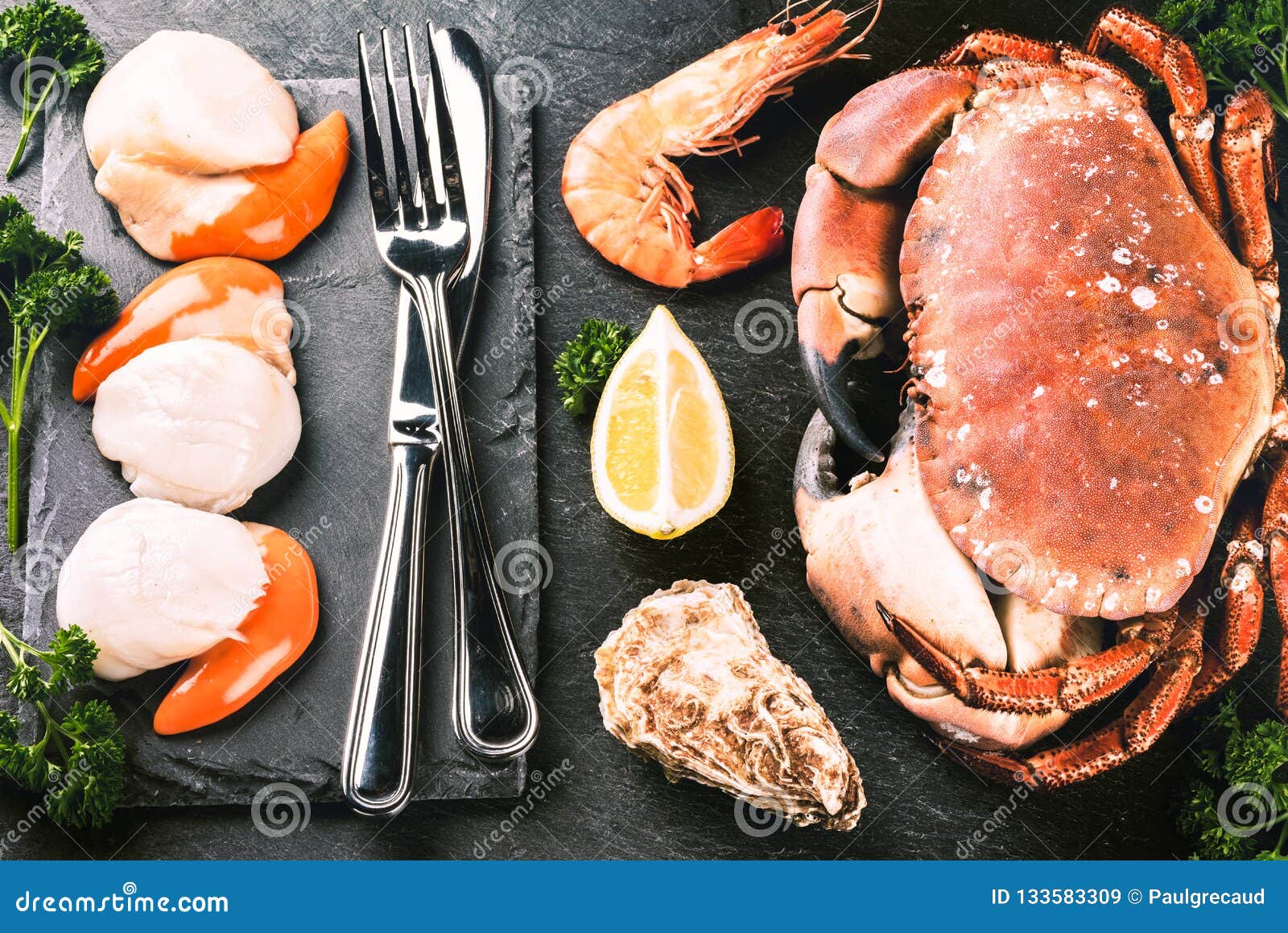 fine selection of crustacean for dinner. crab, scallops and oyst