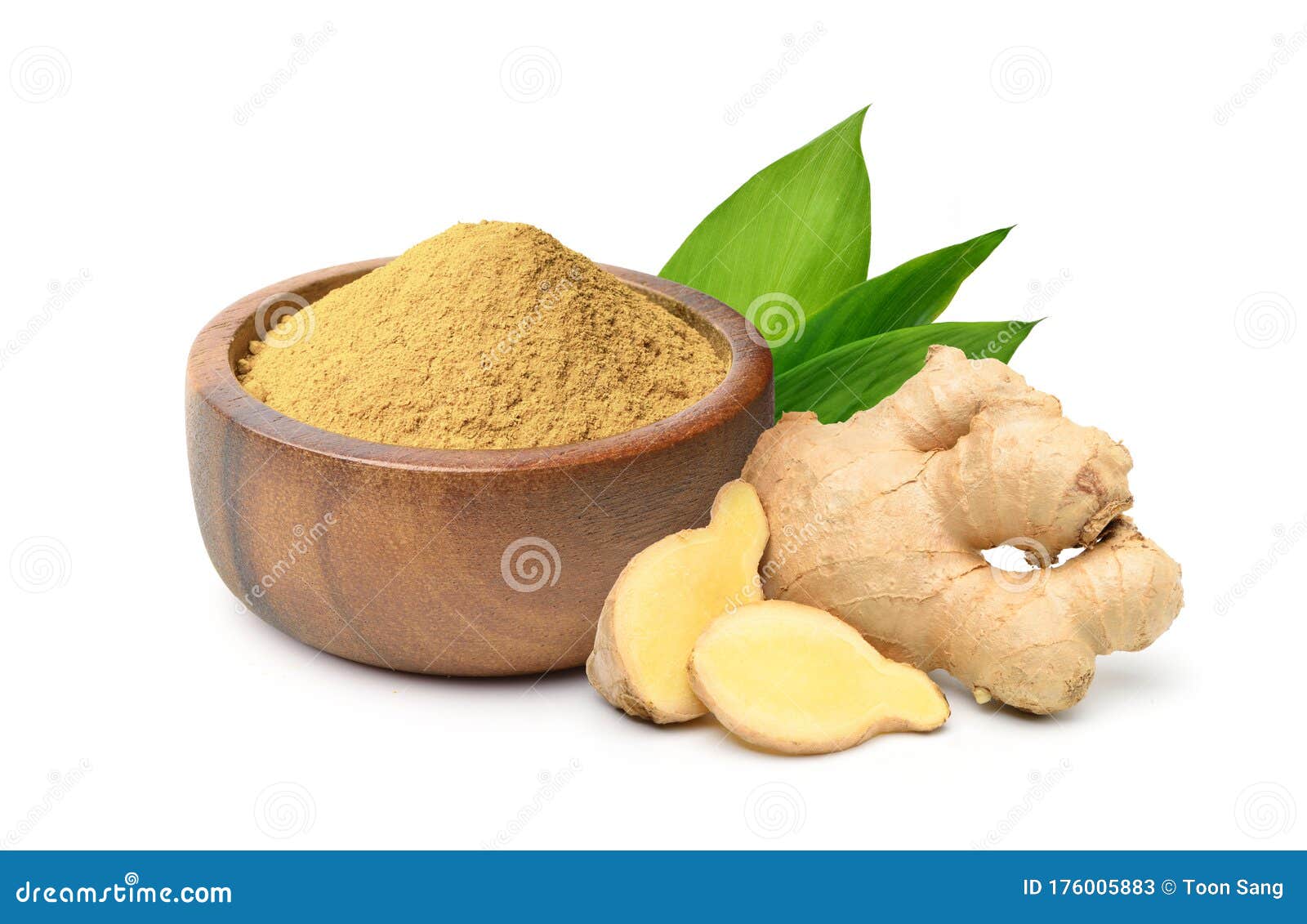 finely dry ginger powder in wooden bowl