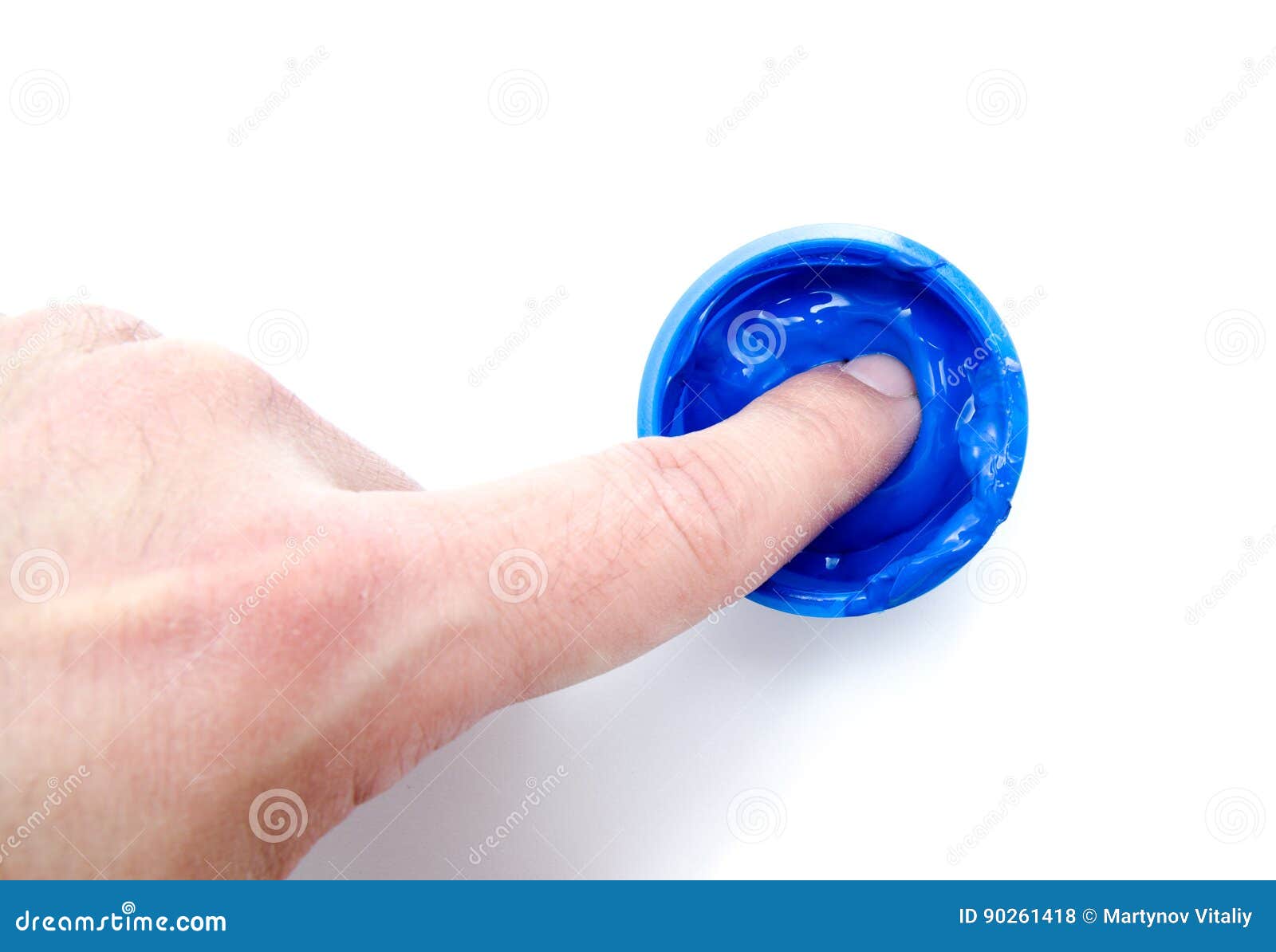 Finger and Blue Color Paint in a Jar on White Background Stock Photo