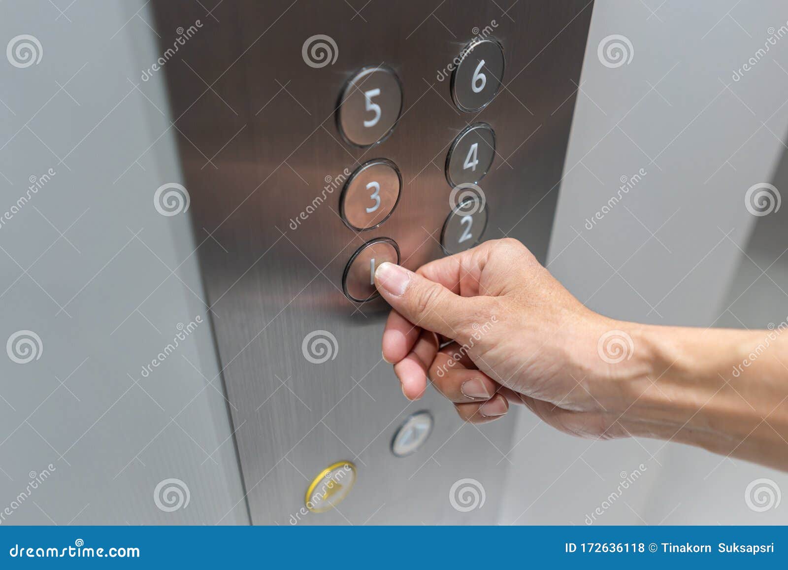 Finger Hand Press Reaches a Button of Elevator Call Inside the Modern