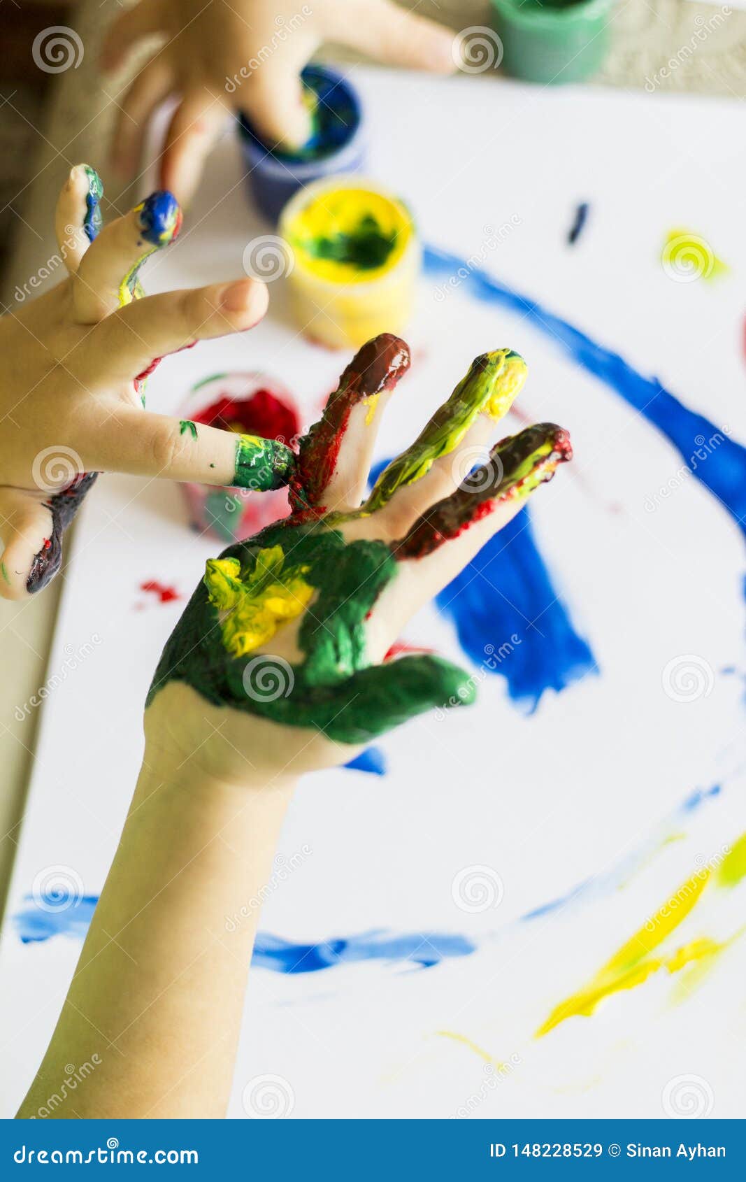 Hand of Child while Doing Fingerpaint. Stock Image Image of creative
