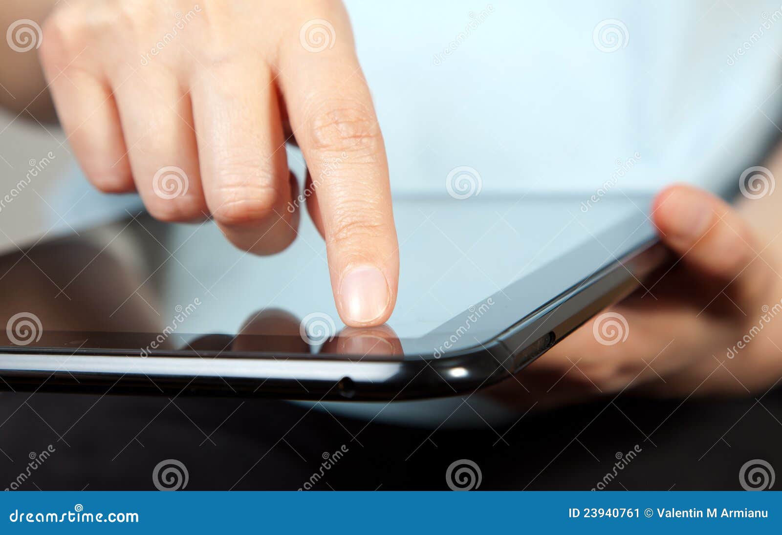 finger pointing on tablet