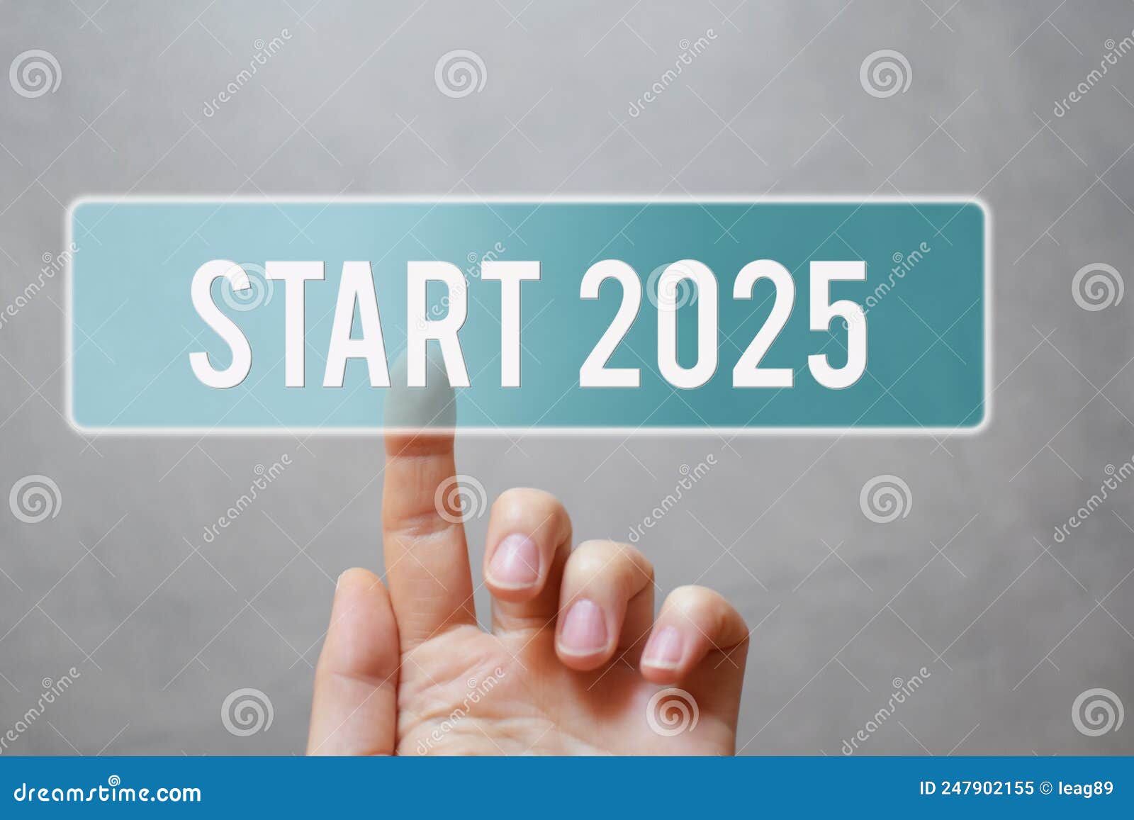 Finger Pressing Blue Transparent Start 2025 Button on Virtual Interface on Gray Background with