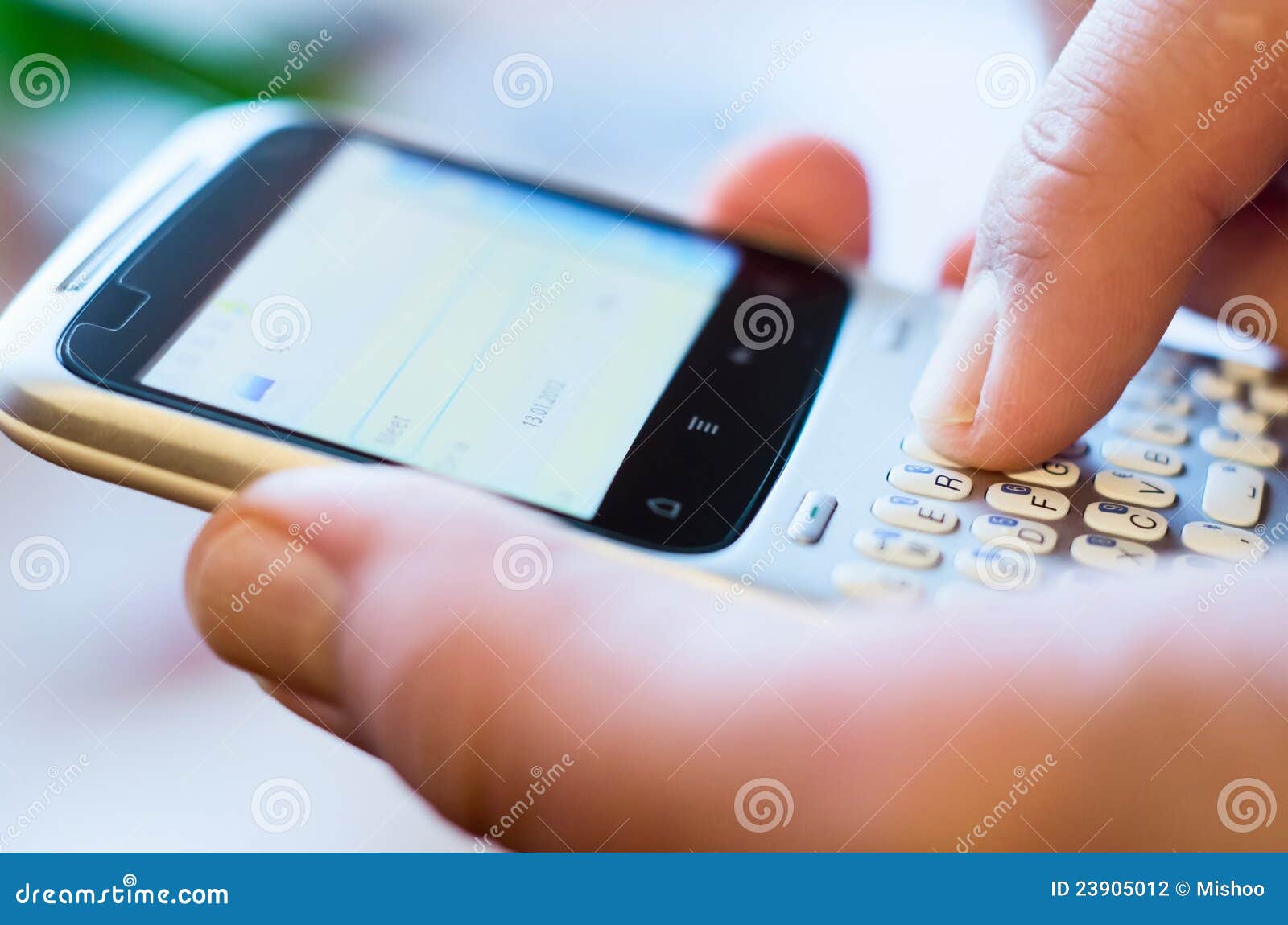 finger on qwerty smartphone