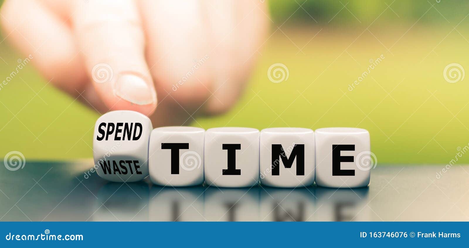 Finger Turns a Dice and Changes the Expression `waste Time` To `spend