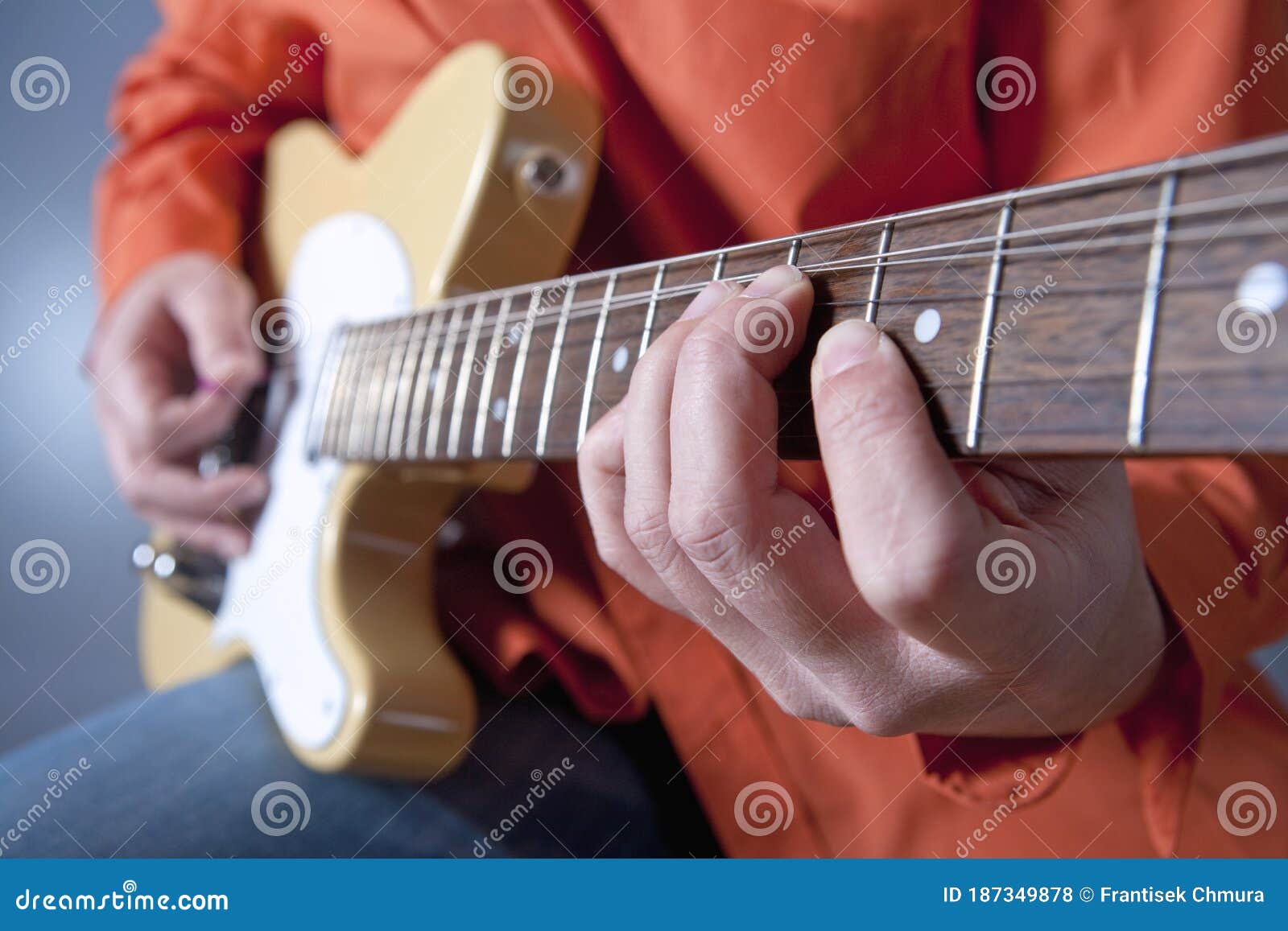 Fingers of a Guitar Player Playing Electric Guitar Stock Photo Image