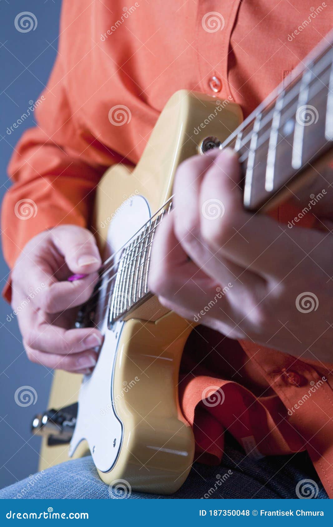 Fingers of a Guitar Player Playing Electric Guitar Stock Photo Image