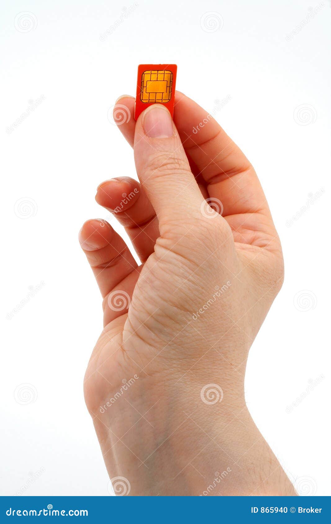 fingers holding a mobile phone gsm sim card