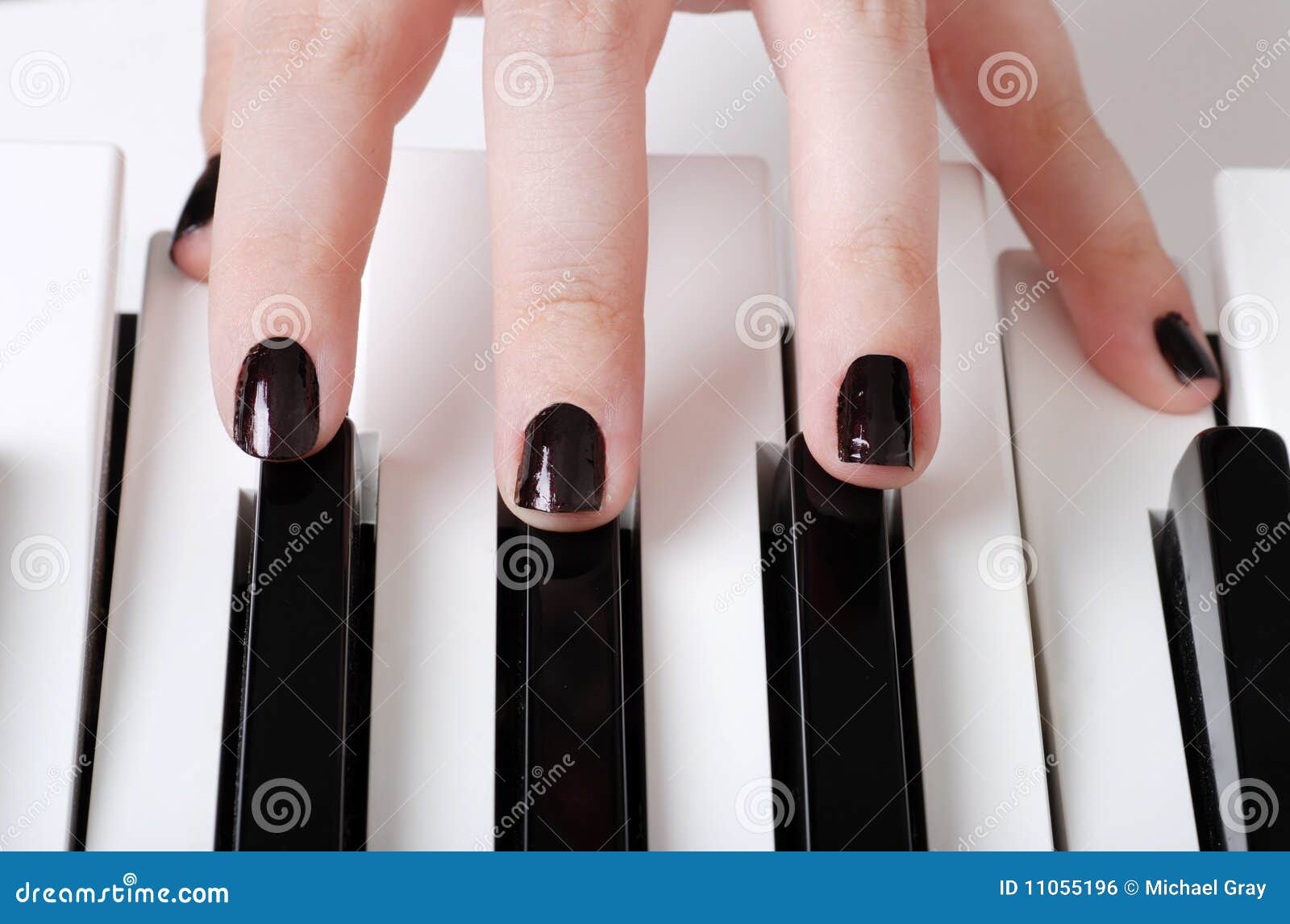 Fingers on piano keys stock photo. Image of musical, melodic 11055196
