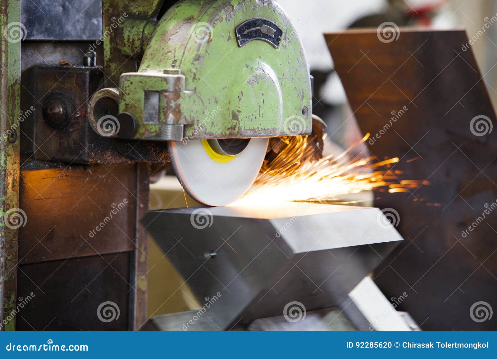 Finishing Metal Surface on Horizontal Grinder Machine Stock Photo