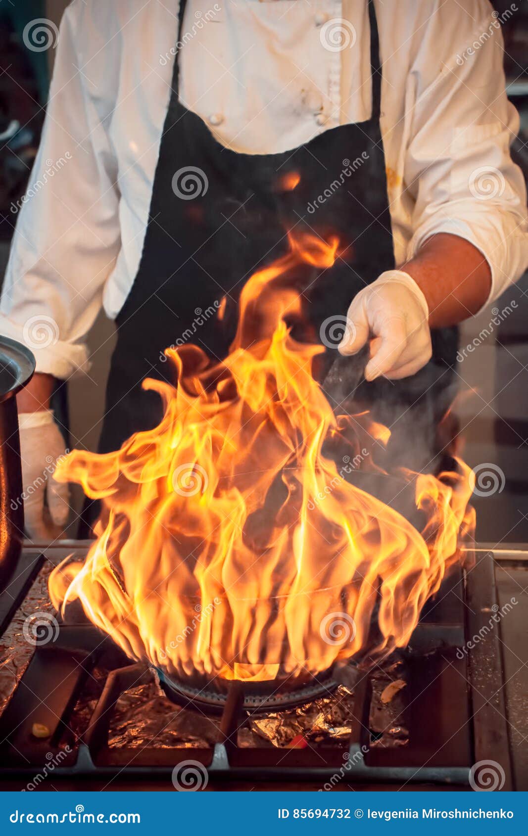 Fire Burn, Cooking on Iron Pan Stock Photo Image of person, flame