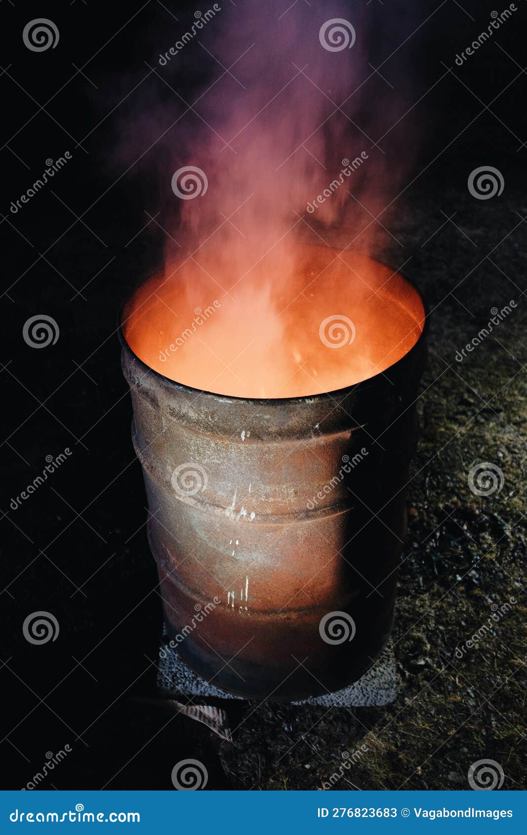 Fire Burning Inside a Metal Barrel Stock Image Image of homeless