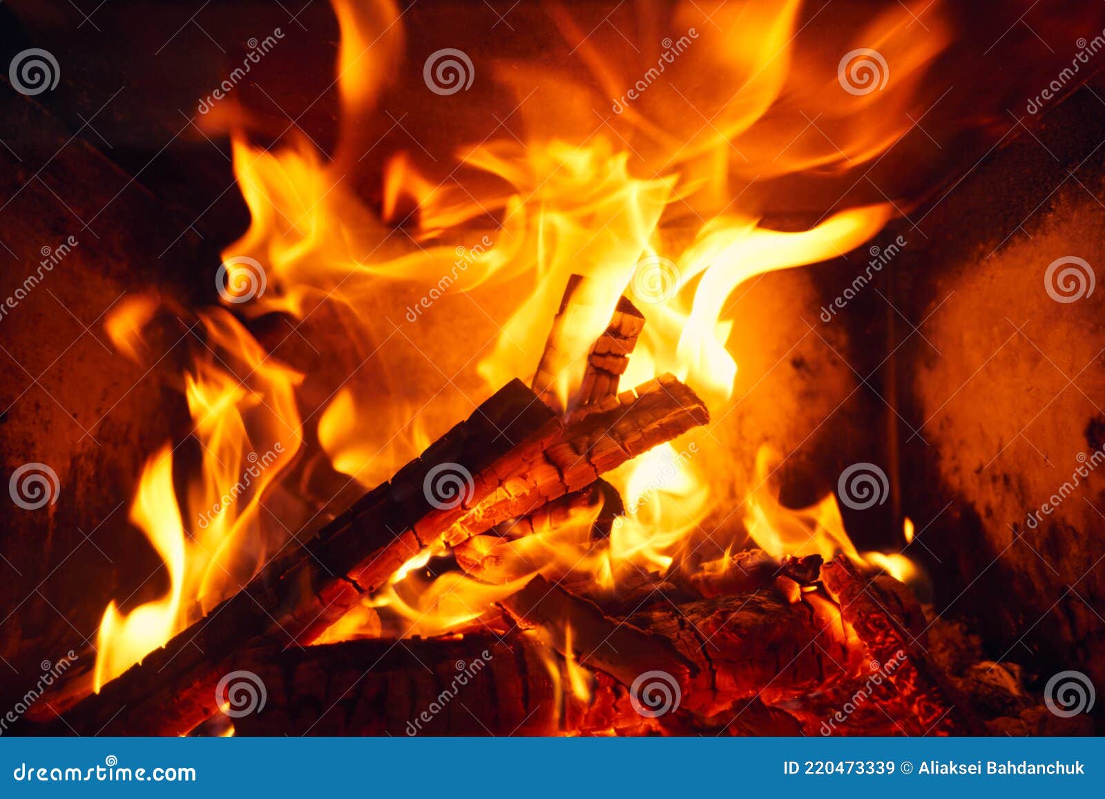 A Fire Burns in a Fireplace, Fire To Keep Warm. Logs Burning in a