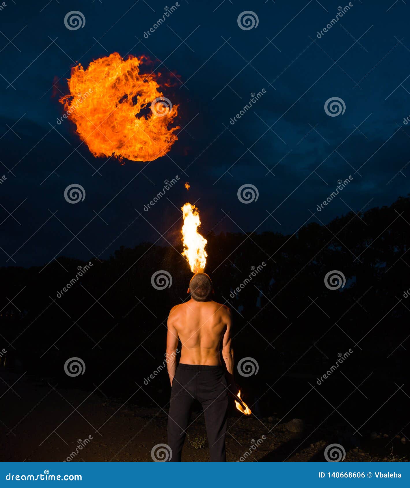 Fireeater Blowing a Large Flame from His Mouth Stock Photo Image of
