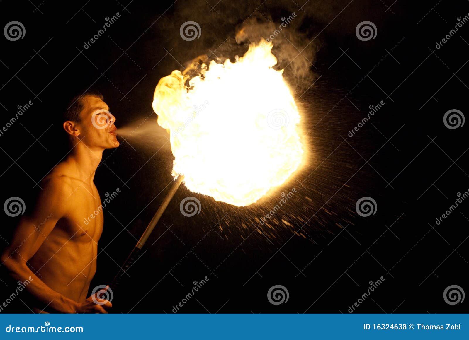 Fireeater performance stock photo. Image of fireplace 16324638