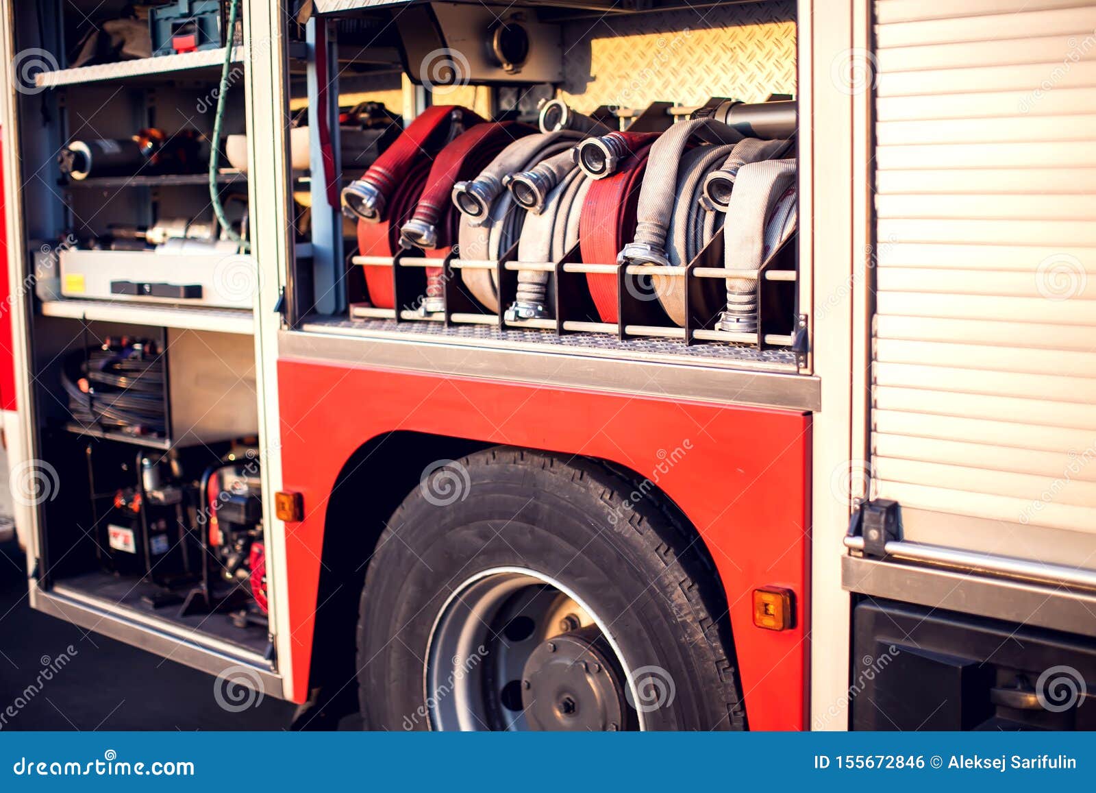 Fire Engine with Equipment in the Fire Department and Ready for