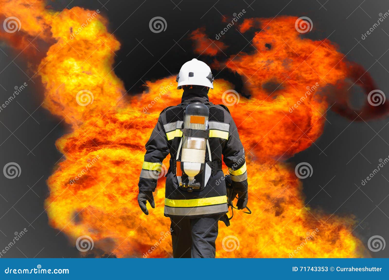 fire fighter on oil and gas industry, successful firefighter at work , fire suit for fighter with fire and suit for protect fire
