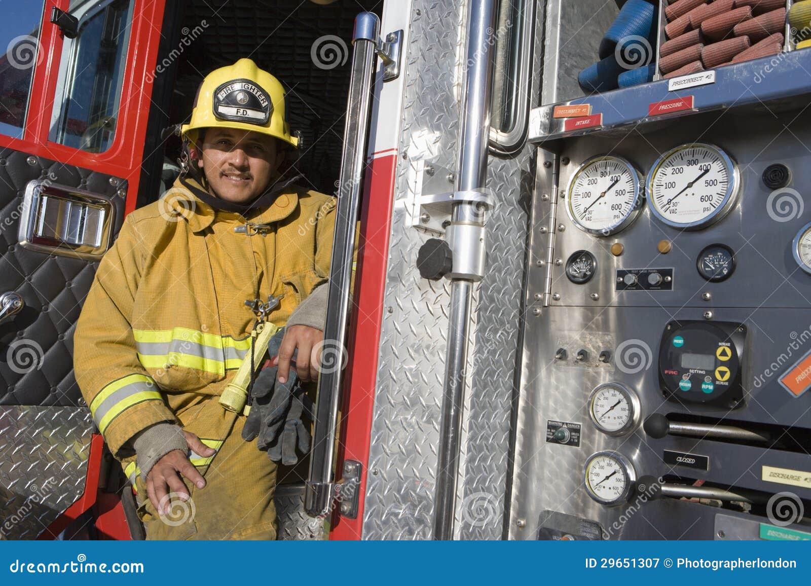 fire fighter sitting at fire brigade's door