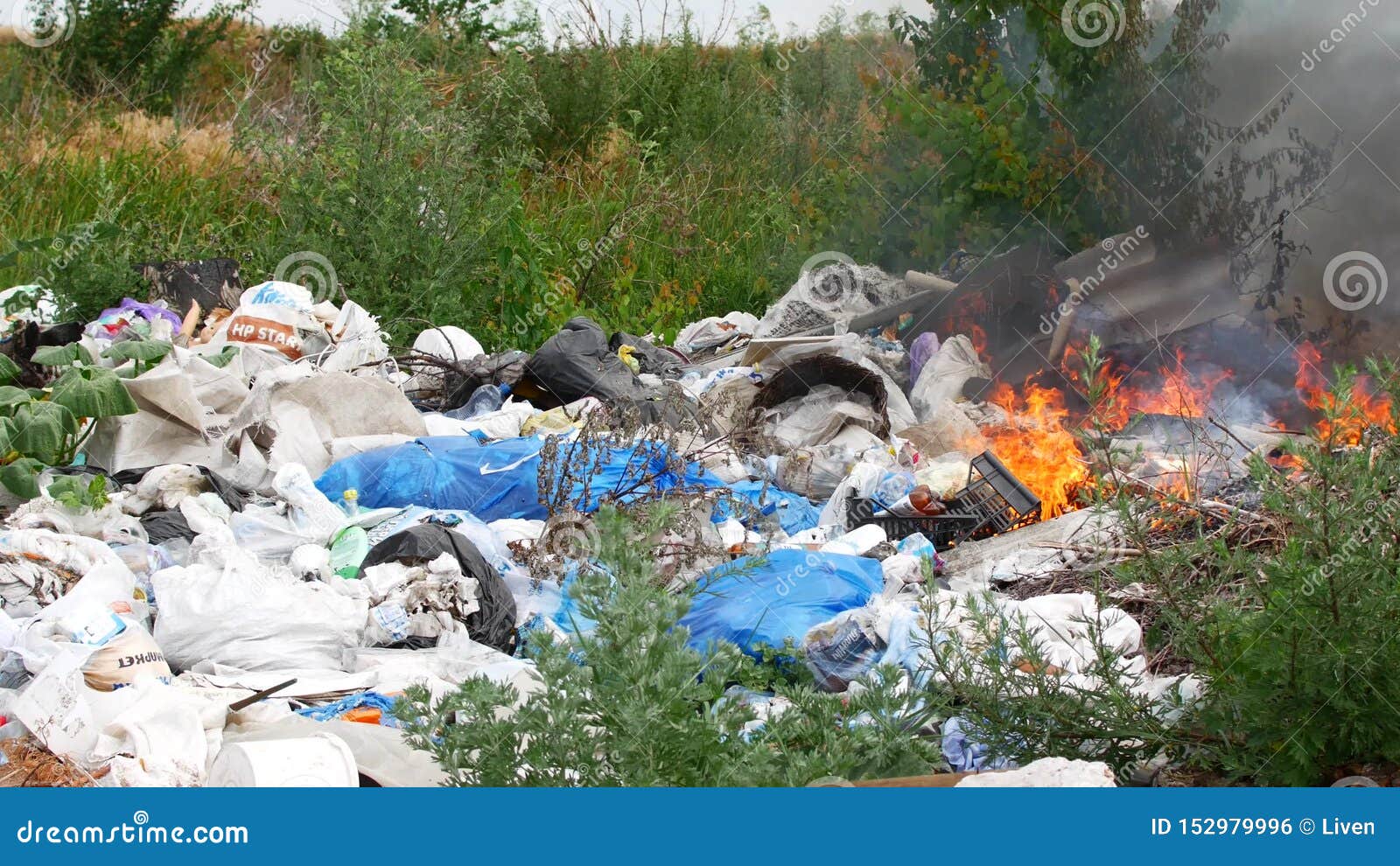 Fire at the Garbage Dump. Burning Garbage, Ecology in Danger Stock
