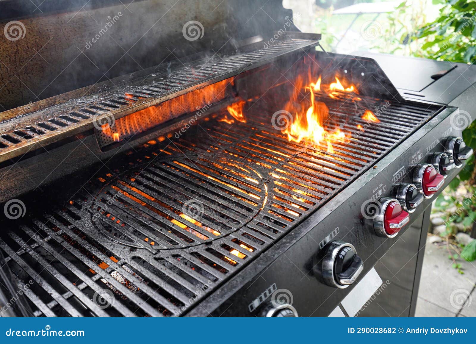 The Fire Heats Up the Grate on a Gas Grill for Grilling Meat Stock
