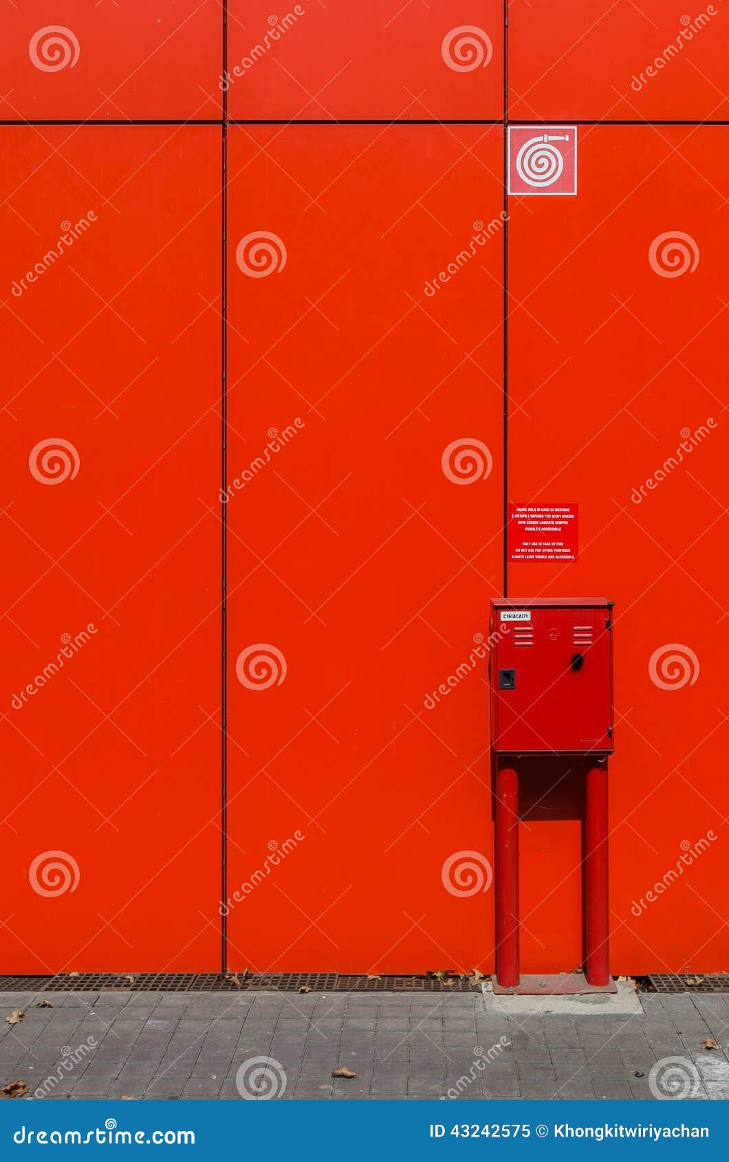 Fire Hose on Red Wall Editorial Image Image of equipment