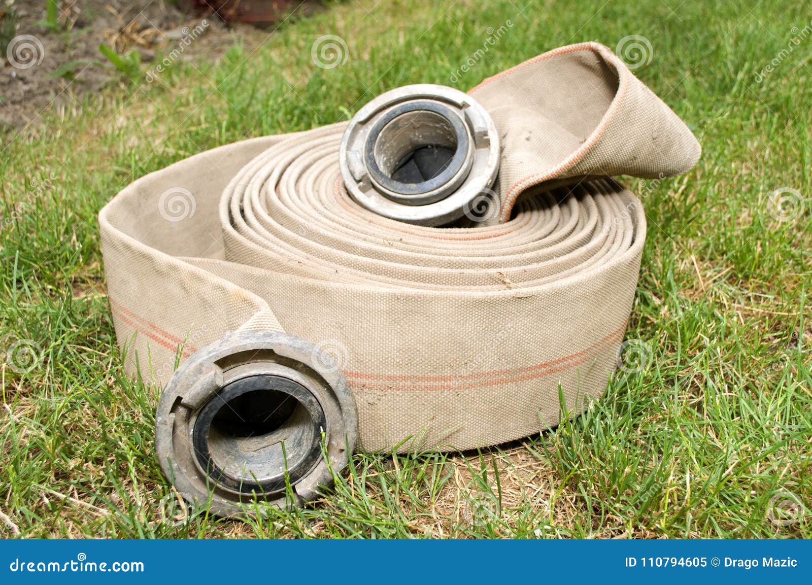 Fire hose for water stock image. Image of roll, background 110794605
