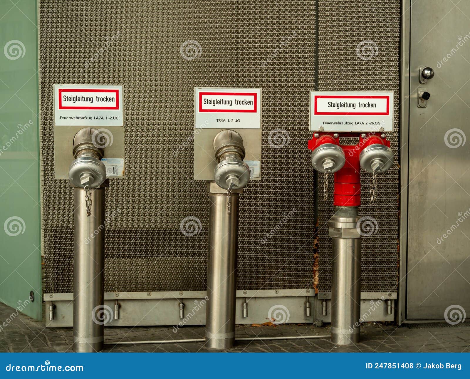 Fire Hydrant at the Building. Stock Photo Image of extinguisher