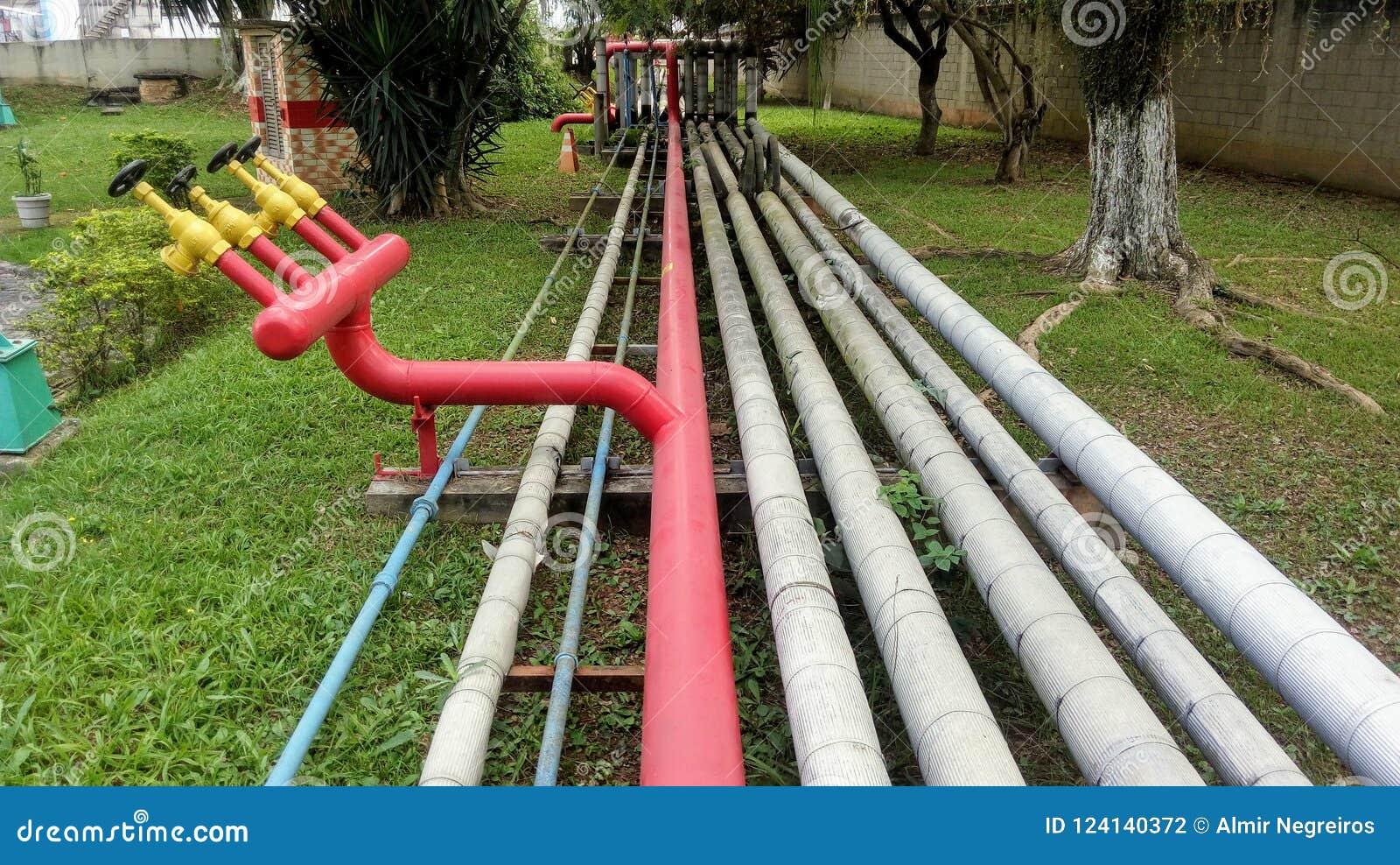 fire and industrial products pipes passing between the gardens