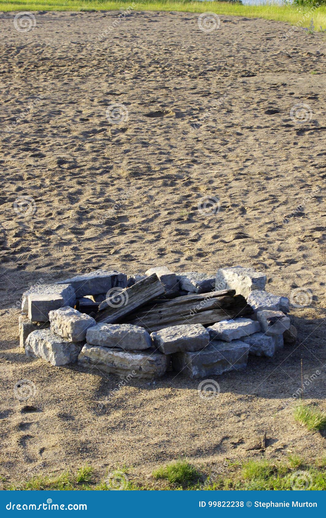 Fire pit in sand stock photo. Image of stone, fire, sand 99822238