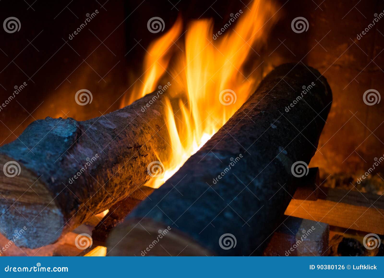 Fire and Wood Burning in a Fireplace. Closeup Image Stock Photo