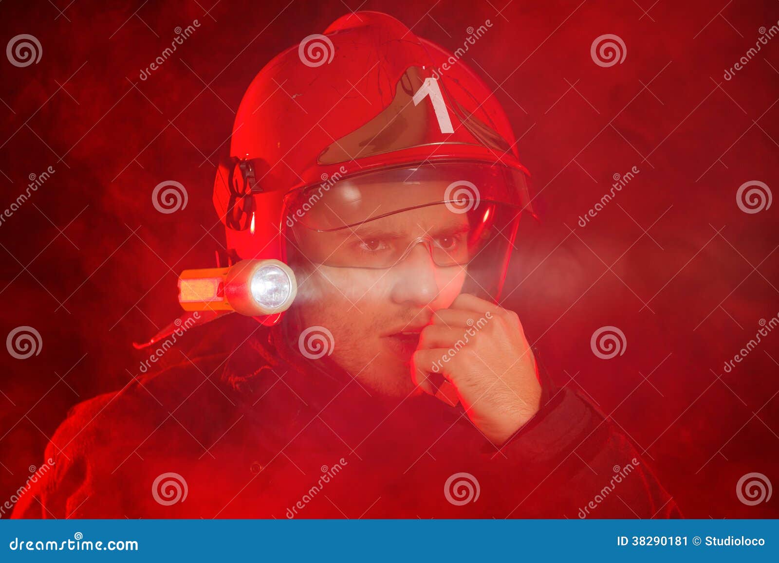 Firefighter in Action Using Walkie-talkie Stock Image - Image of danger