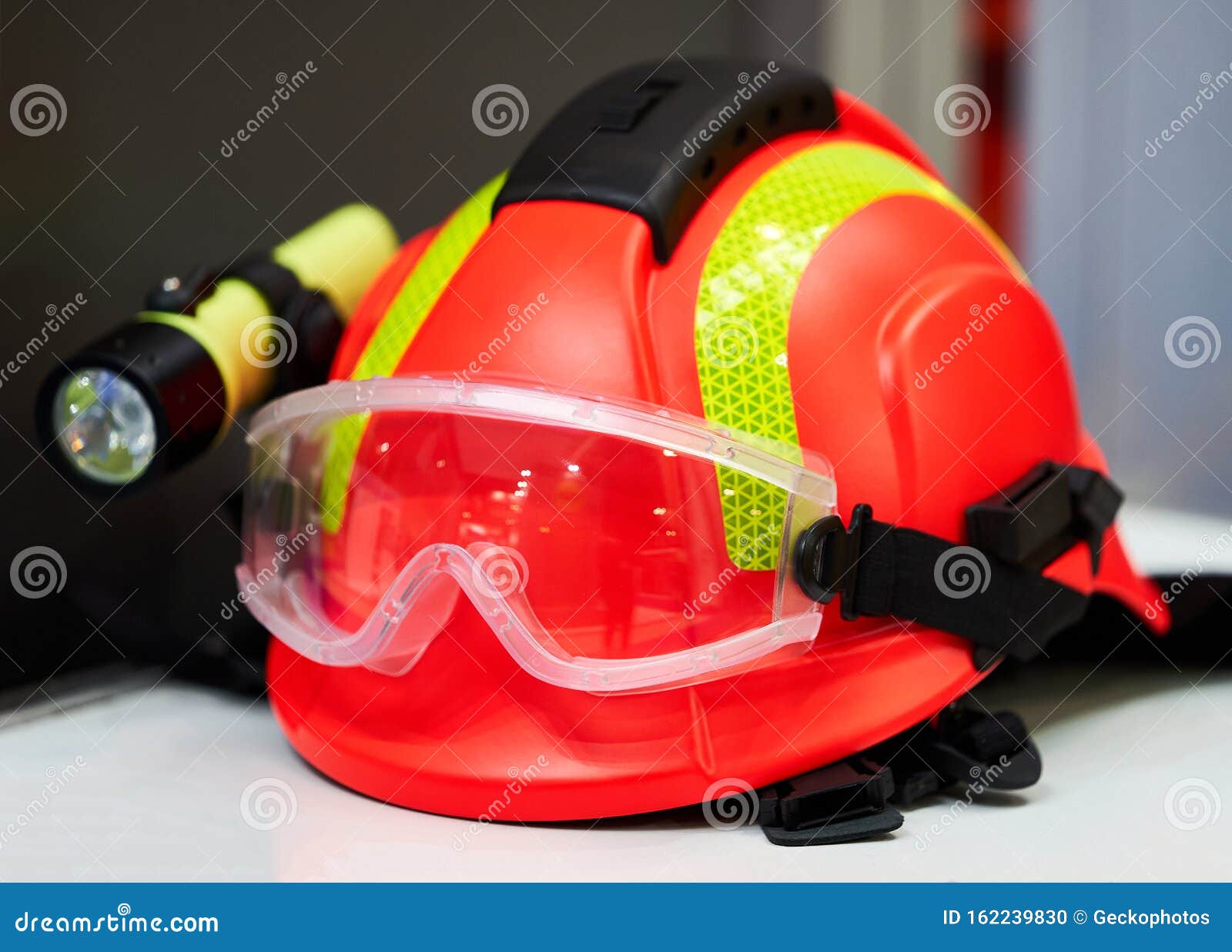 Firefighter Helmet with Flashlight, Closeup. Construction Helmet with